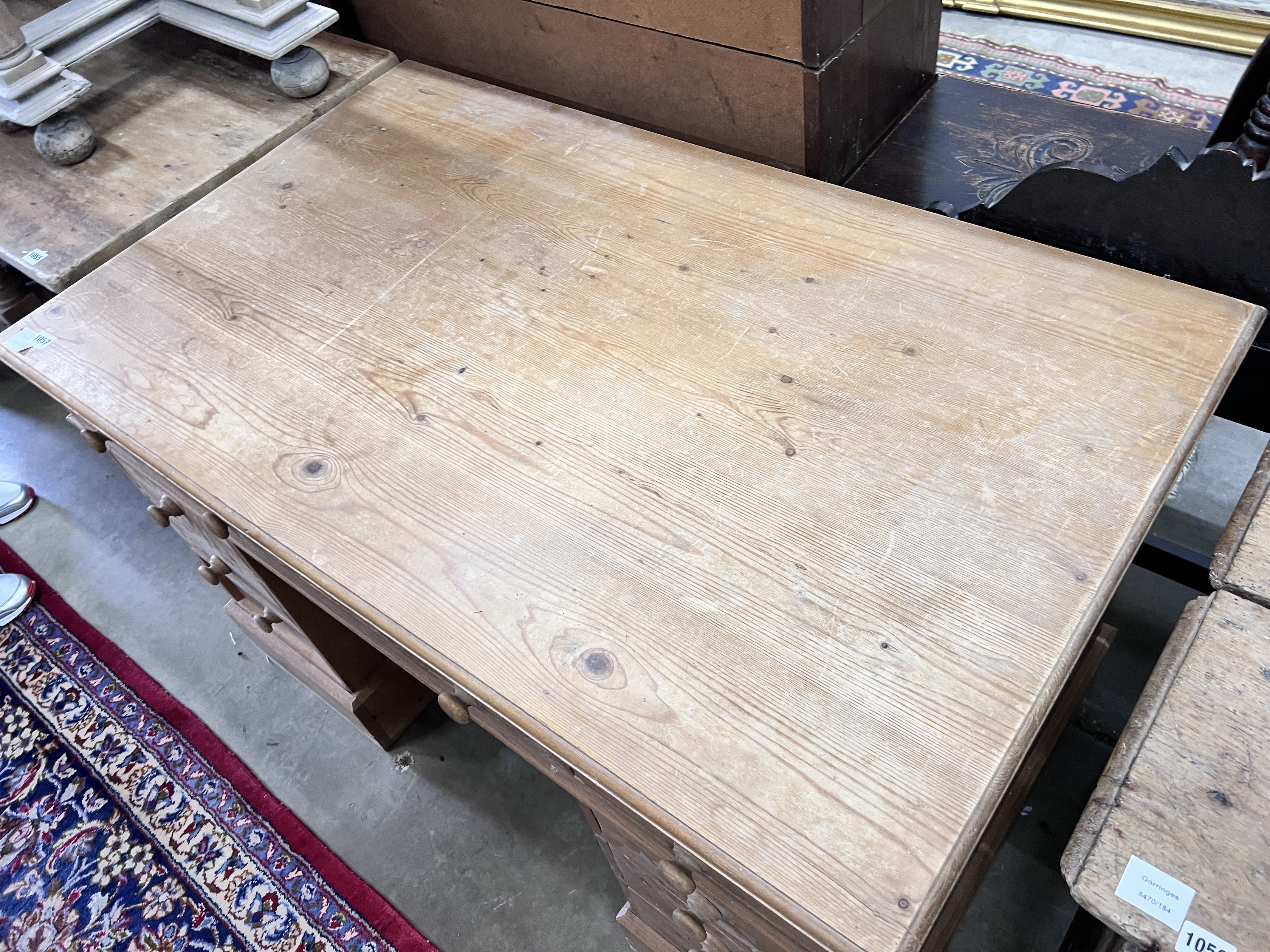 A modern Victorian style pine pedestal desk, width 120cm, depth 72cm, height 76cm